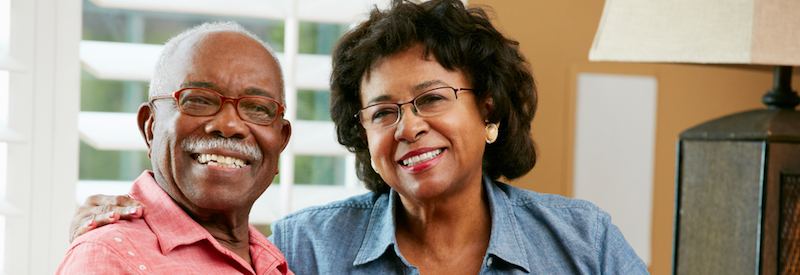 An old smiling couple