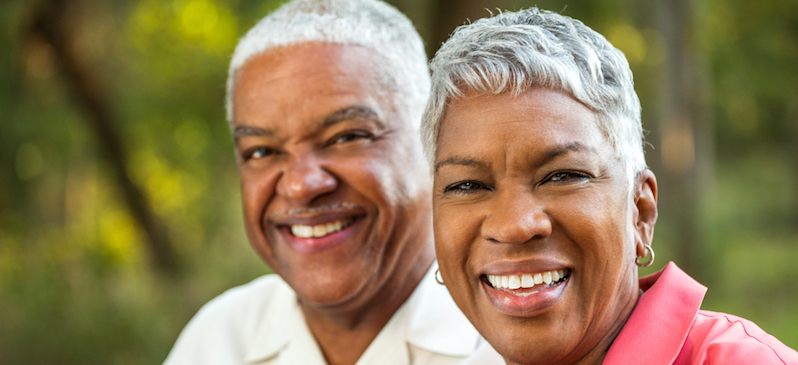 An old smiling couple